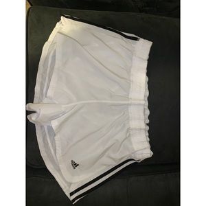 white adidas shorts with black stripes